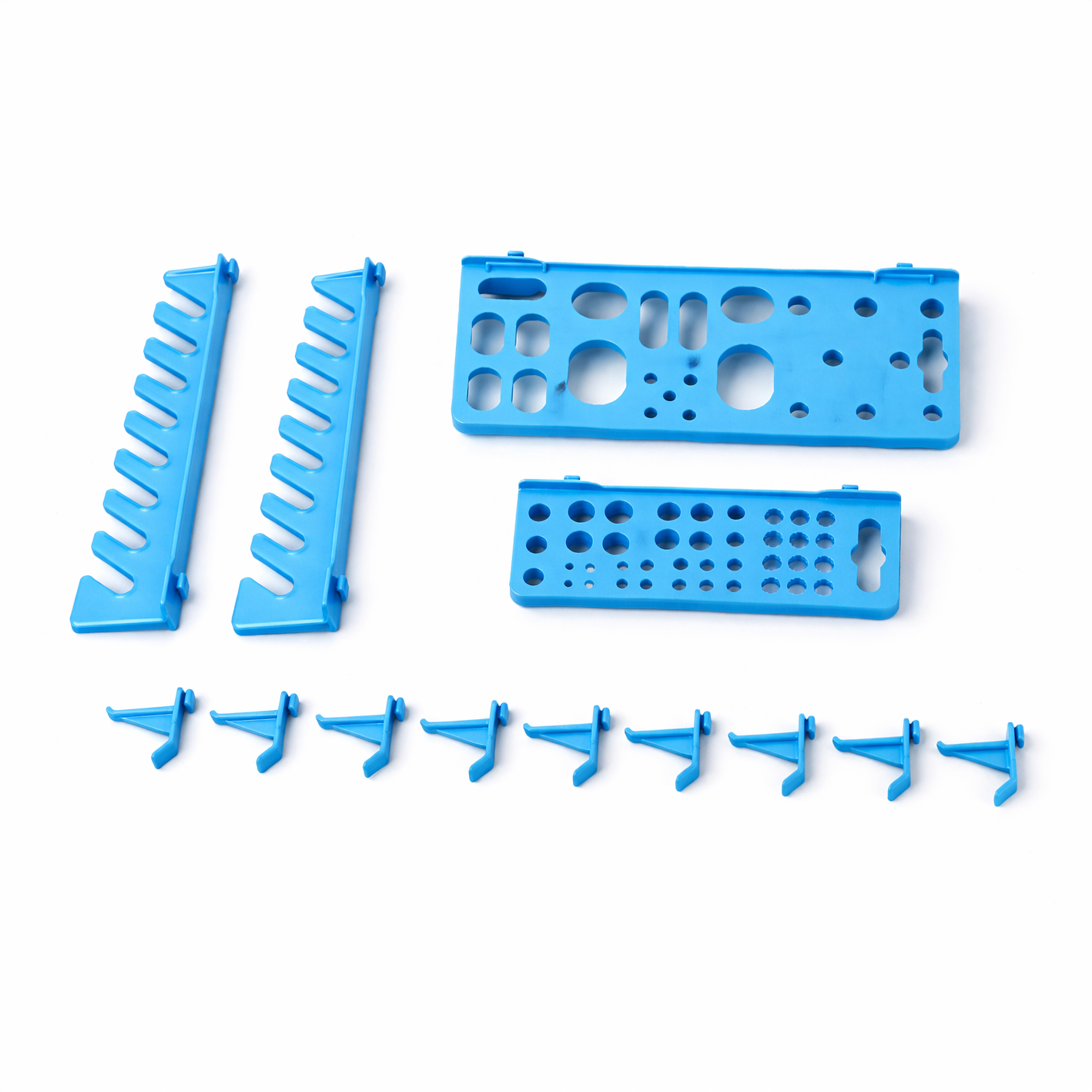 Tablero organizador de herramientas modular de pared Howard con contenedores de almacenamiento de varios tamaños.